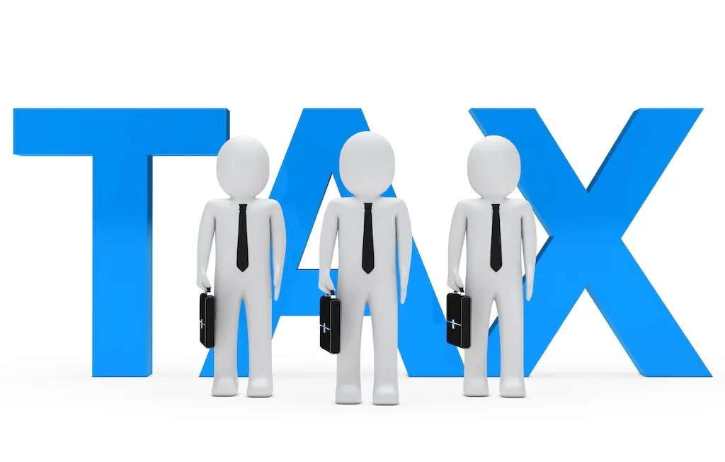 Rag dolls with the word "tax"