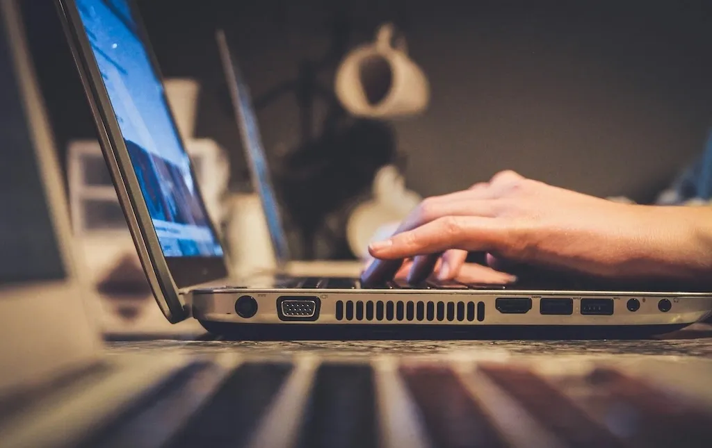 typing on a laptop