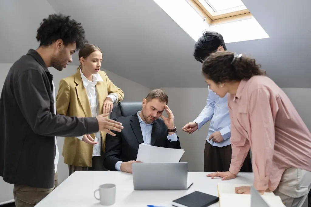 People in a meeting stressed