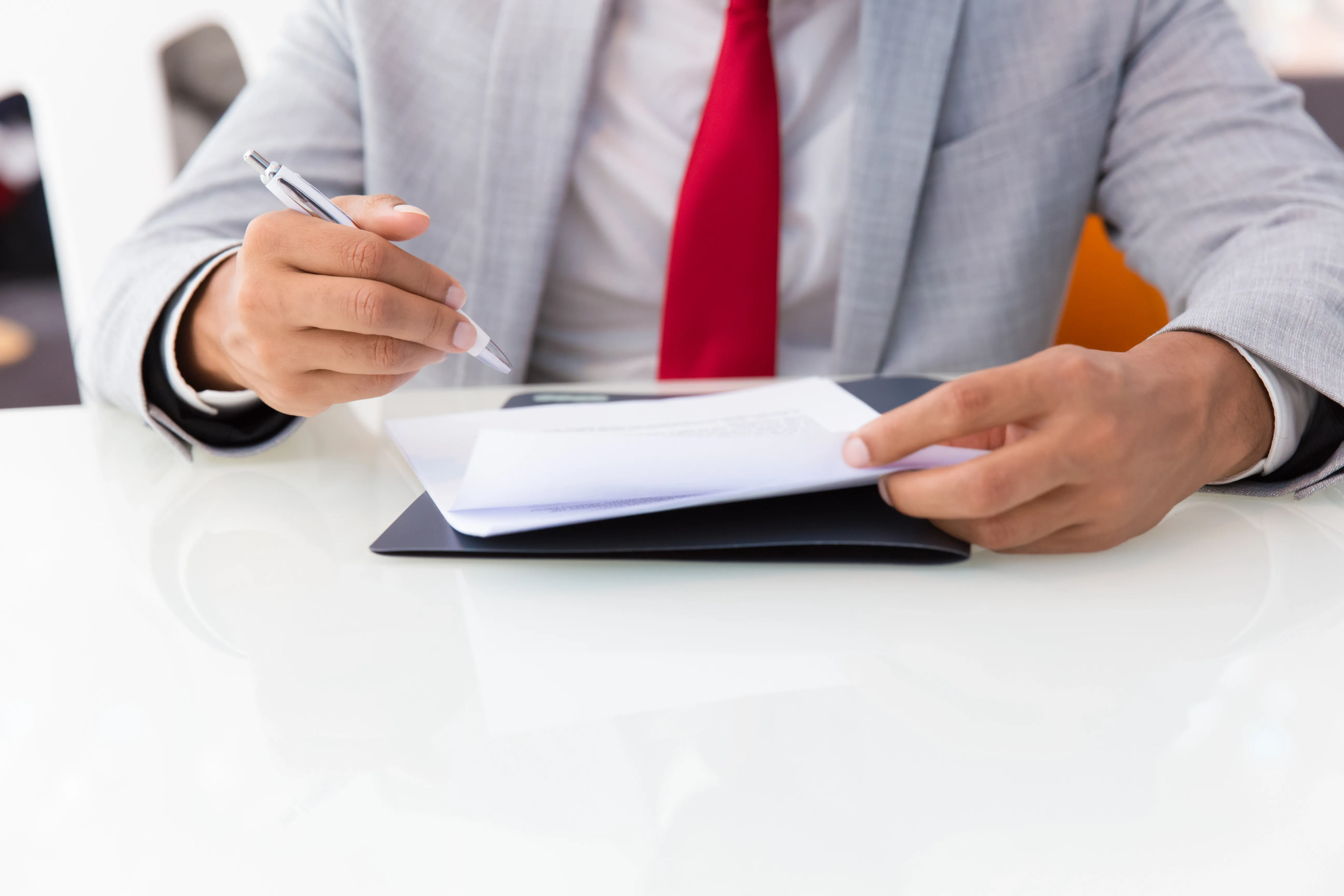 businessman-signing-contract.webp