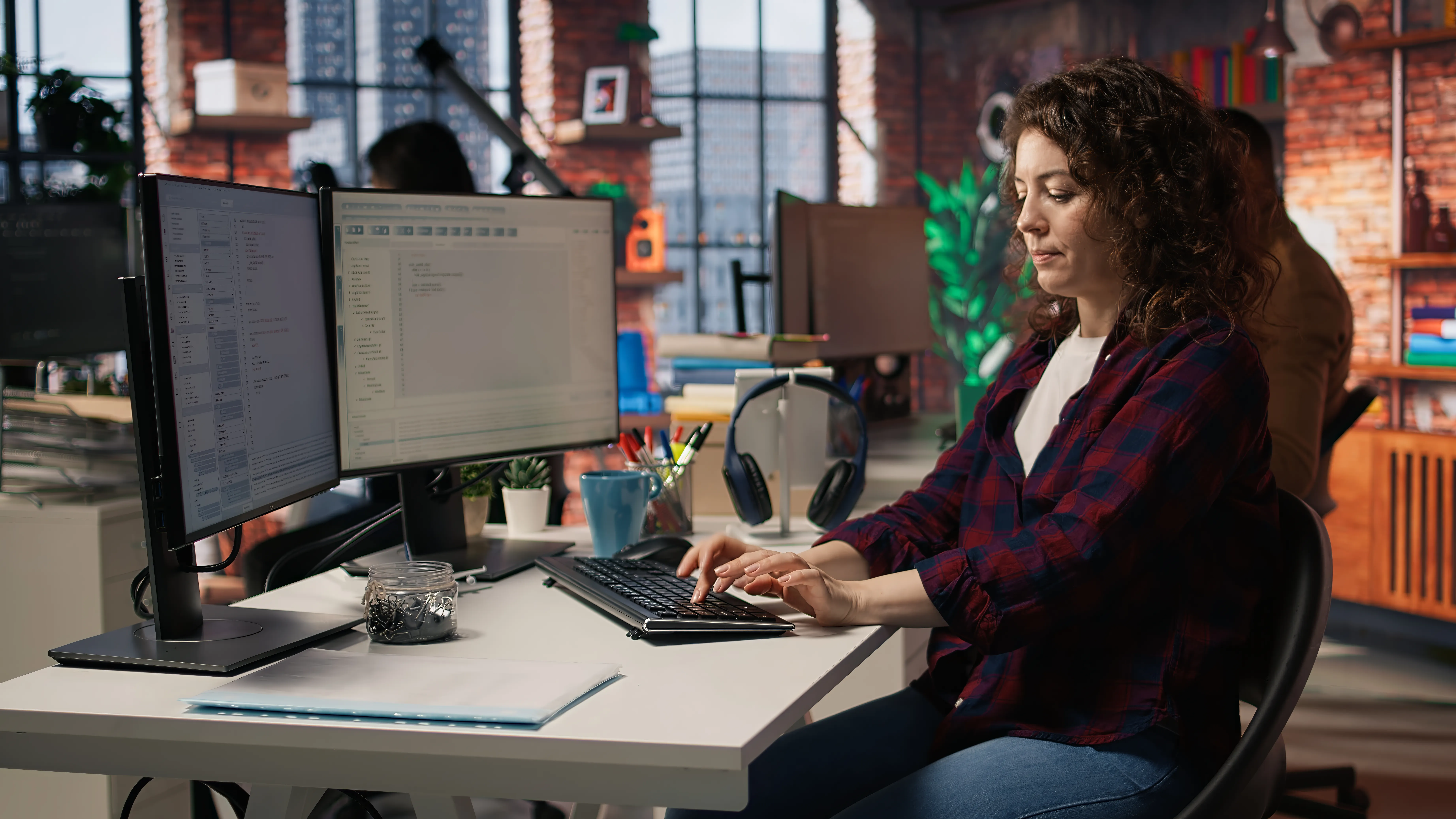 cheerful-it-expert-using-programming-languages-pc-it-startup-office.webp