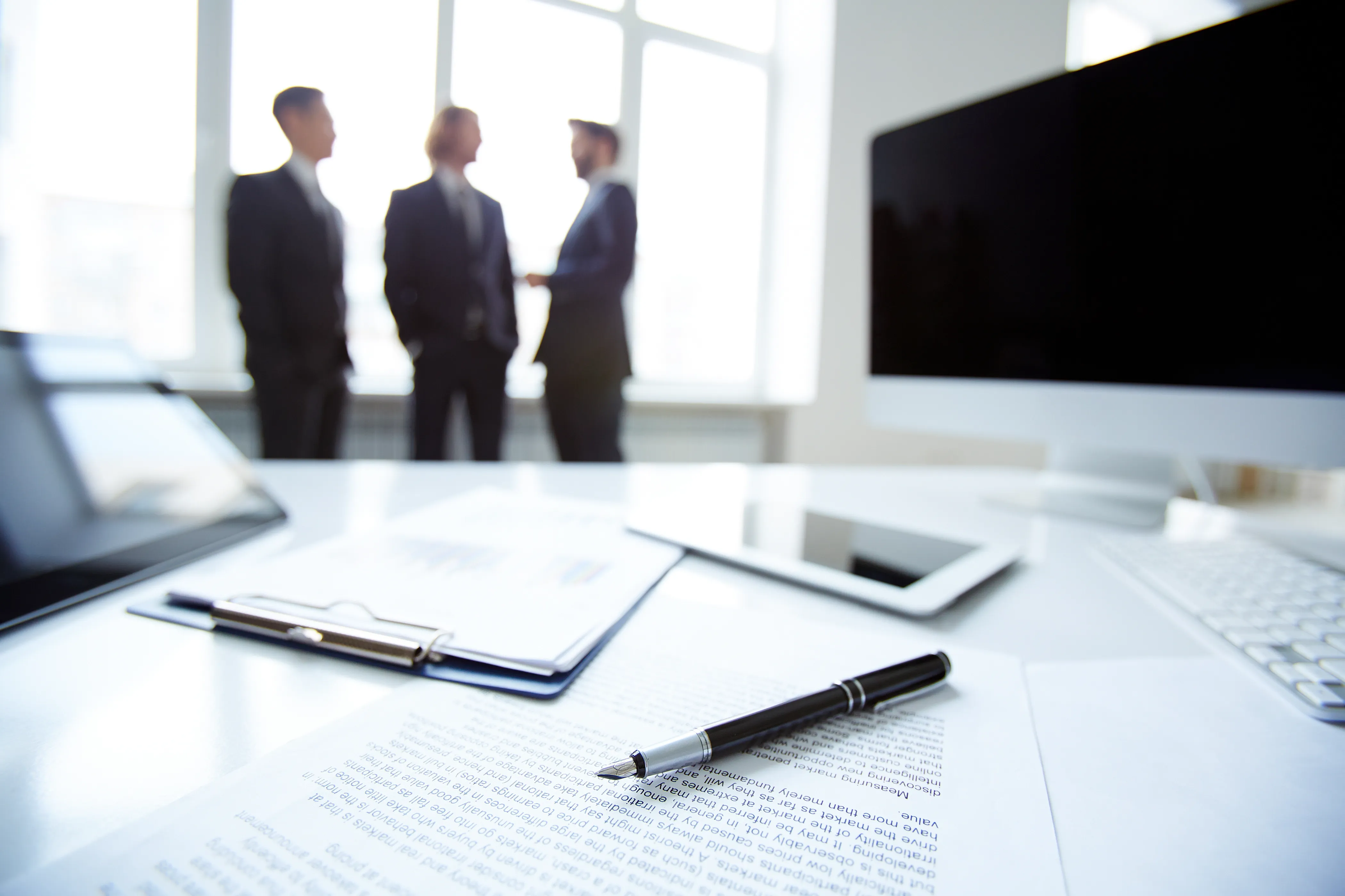 close-up-pen-financial-report.webp