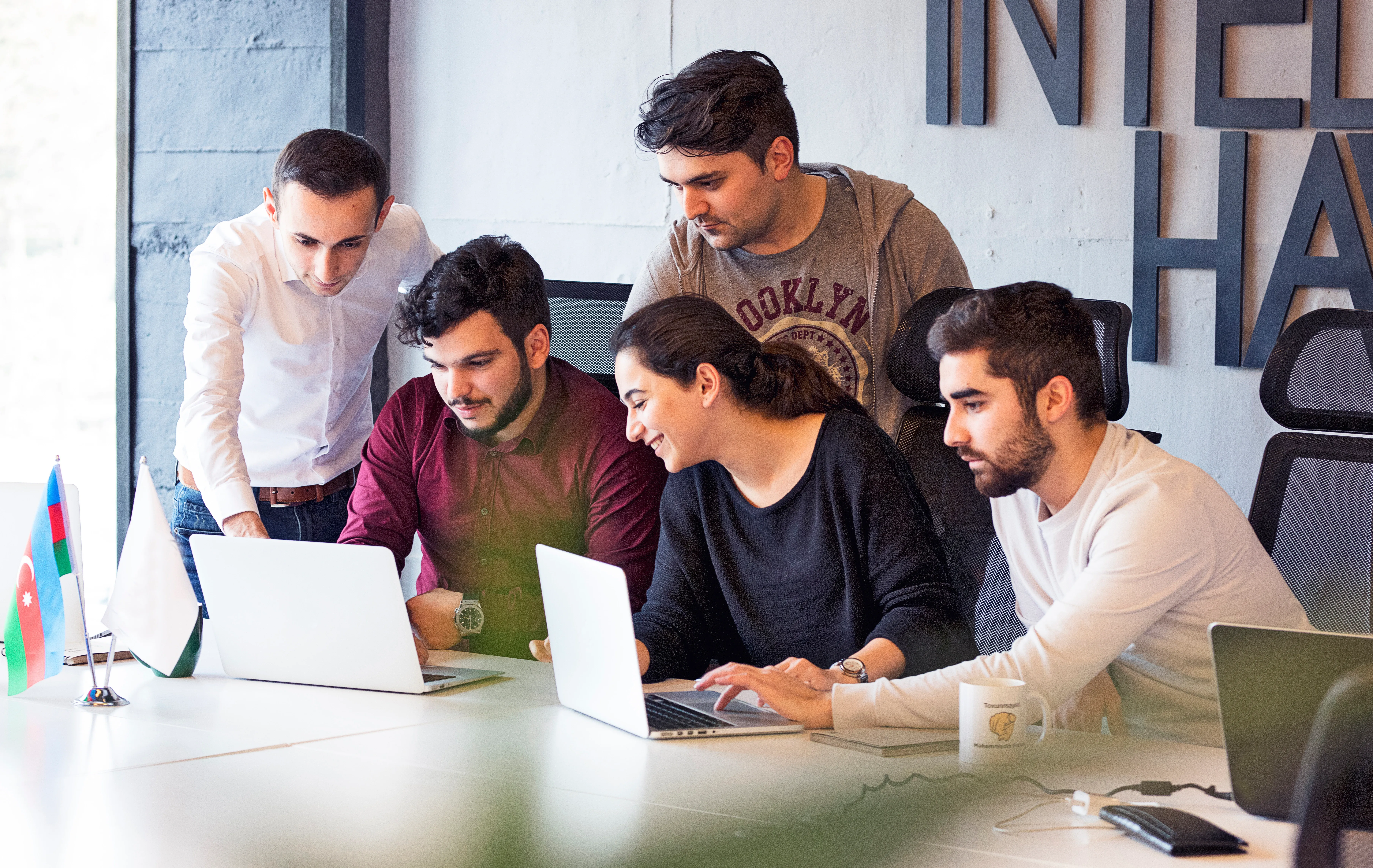colleagues-working-project-discussing-details.webp