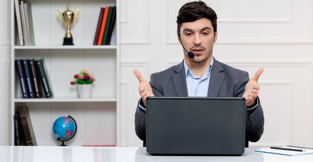 Image from customer-service-cute-guy-grey-suit-with-computer-headset-talking-with-client-1024x531