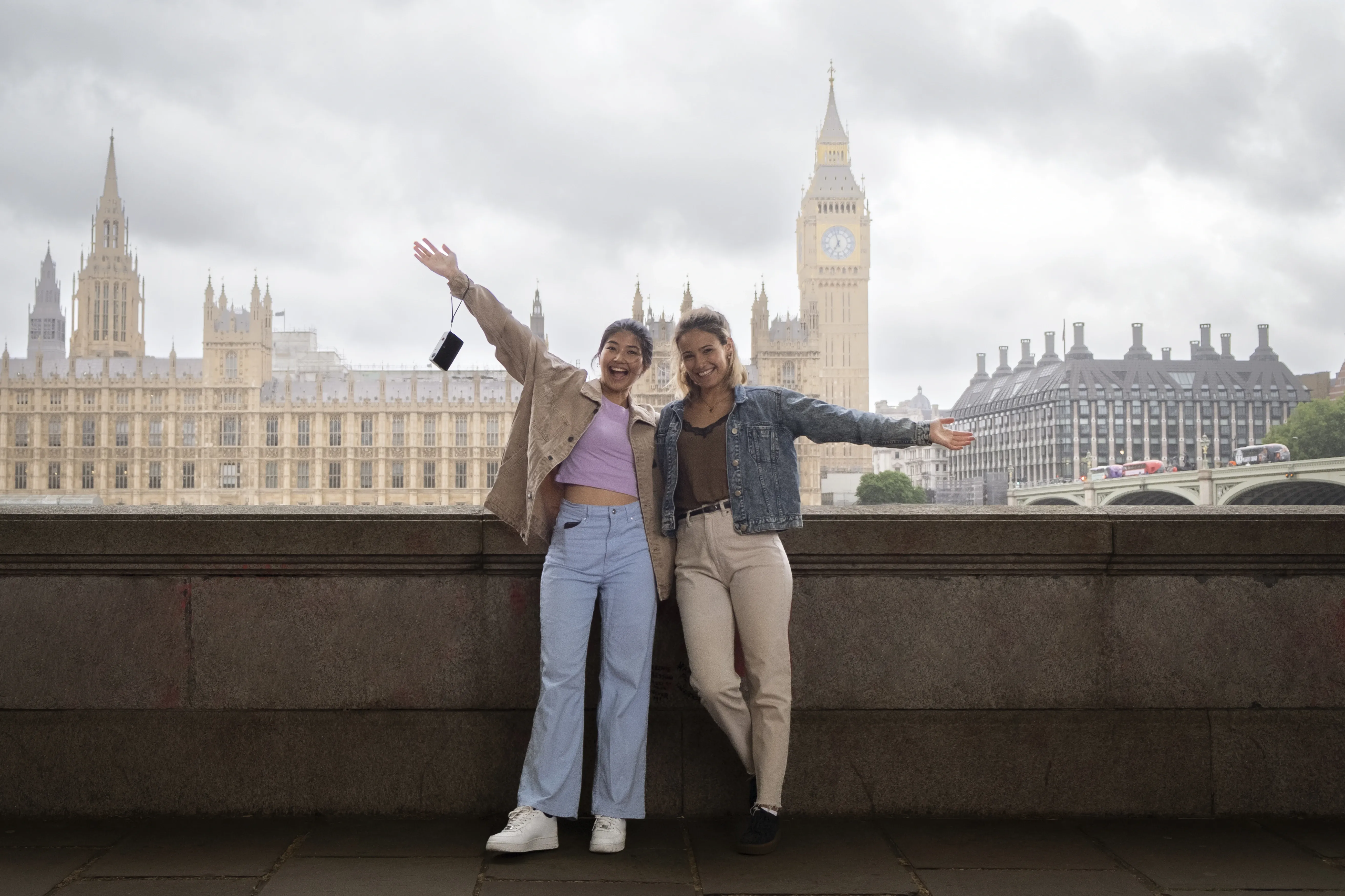 full-shot-smiley-women-outdoors.webp