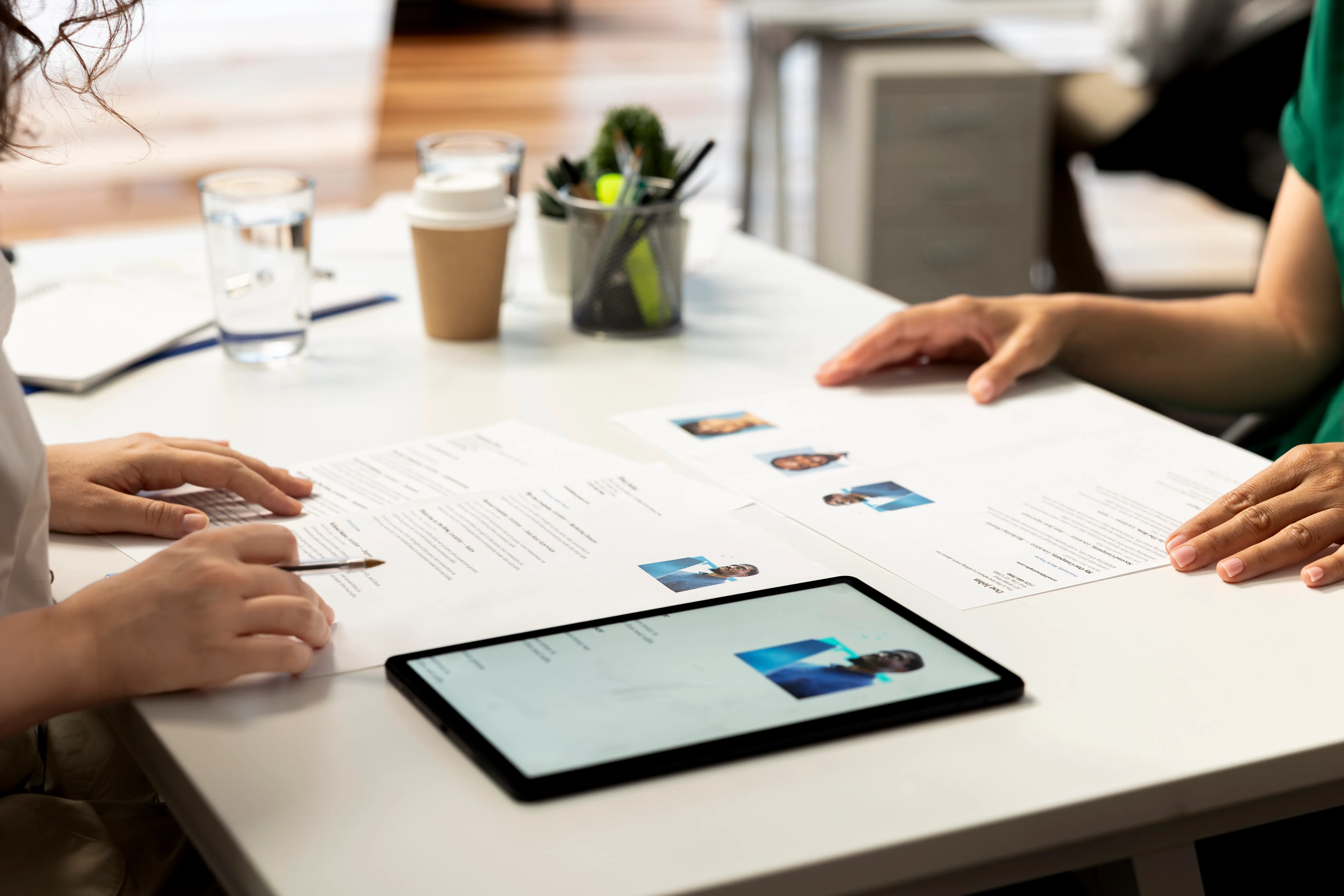 hr-manager-using-device-evaluate-if-applicant-qualifications-match-demands.webp